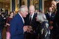 britains-king-charles-iii-speaks-to-guests-during-a-news-photo-1683312434