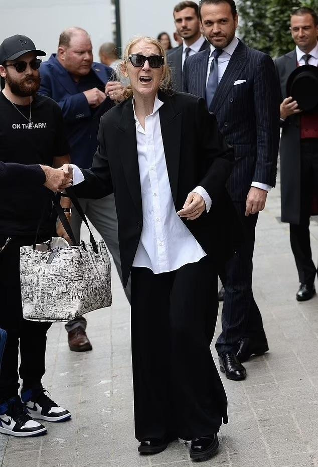 celine-dion-arriving-at-her-hotel-in-paris-this-morning-v0-t669si6ftaed1